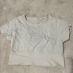 size medium OFFLINE By Aerie Sidewalk Seamless cream colored Cropped T-Shirt